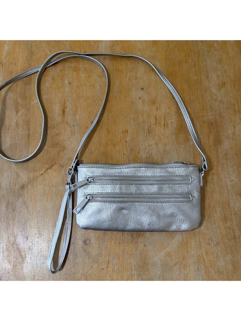 Safe Keeper Pewter Faux Leather Crossbody Bag That Has Wristlet Strap